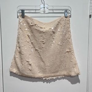 Nasty Gal blush sequin skirt.